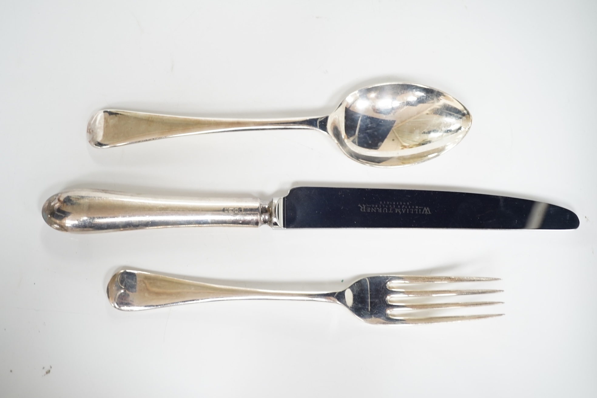 A George VI canteen of silver Hanoverian pattern flatware for six by Goldsmiths & Silversmiths Co Ltd, comprising dessert and table forks and soup and dessert spoons, Sheffield, 1944, 39.6oz, together with eight similar